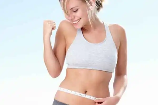 woman happy after fat reduction treatment Brentwood