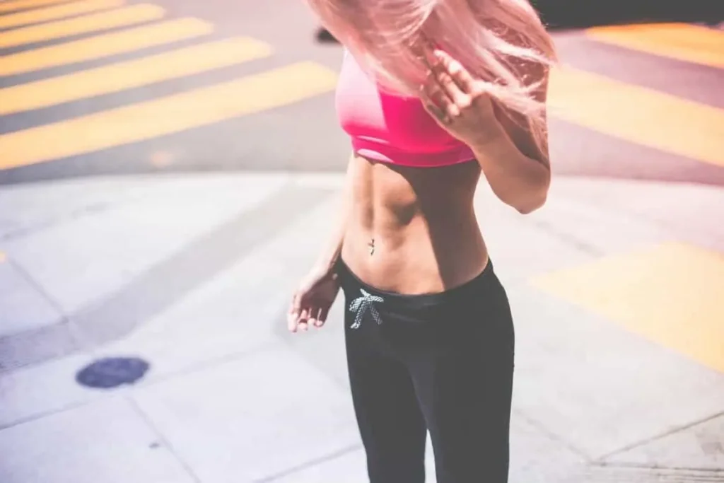 Woman with toned stomach after LA-EMS Body Sculpting Treatment Brentwood